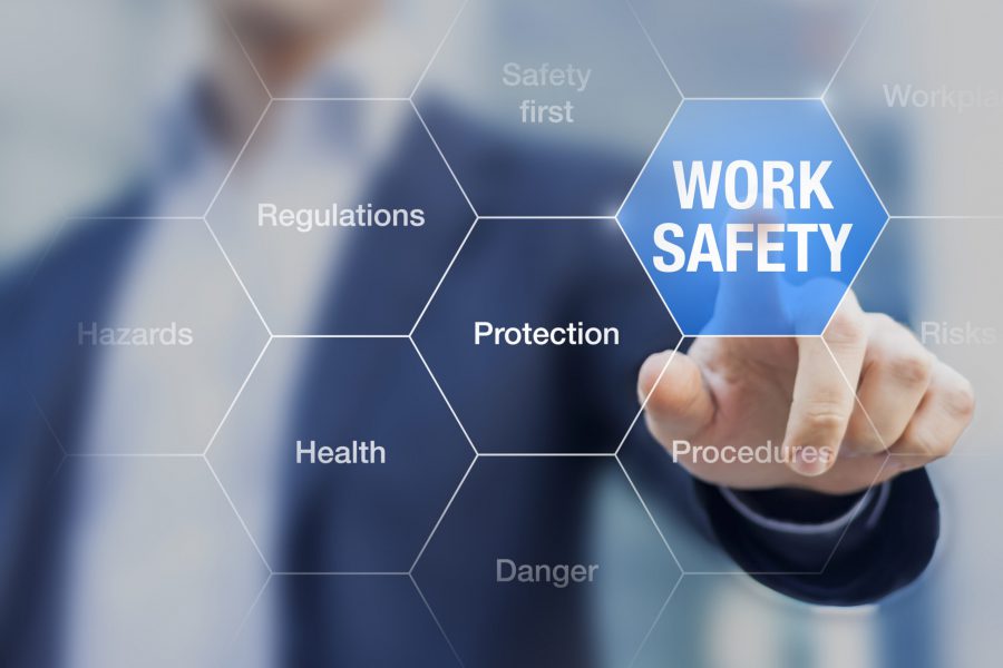 Businessman presenting work safety concept, hazards, protections, health and regulations